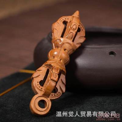 匠心独运，桃木雕琢的平安守护——大金刚杵汽车挂件与深圳市宝安区西乡鸿儒工艺品厂的工艺之美
